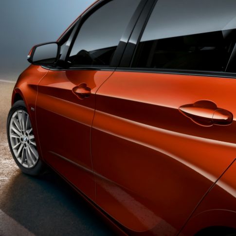 Close-up side BMW 2 Series Active Tourer BMW 2 Series Active Tourer F45 Facelift 2018 Sunset Orange metallic close-up side