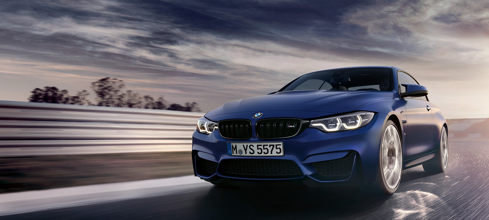 BMW M4 Cabrio BMW M4 Cabrio, tročetvrtinski pogled sprijeda u vožnji na trkaćoj stazi