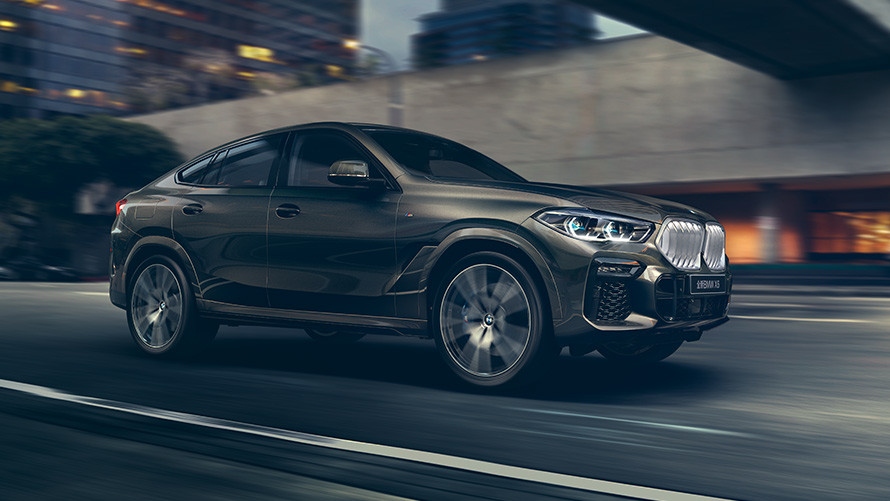 Tročetvrtinski bočni prikaz BMW-a X6 G06 treće generacije BMW serija X; Tročetvrtinski bočni prikaz BMW-a X6 G06 treće generacije