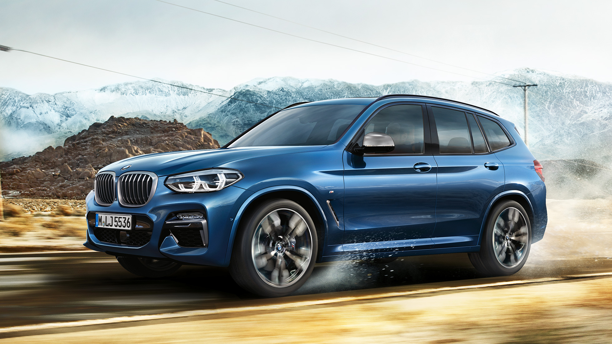 BMW X3 M40i, prikaz obruba i prednjeg blatobrana ispred planine BMW X3 M40i, prikaz obruba i prednjeg blatobrana ispred planine